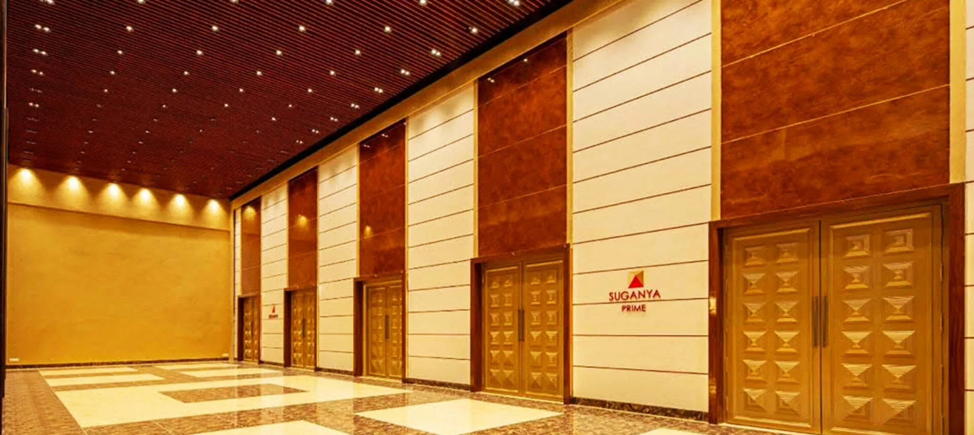Banquet seating in the main hall at Suganya Convention Centre, Pondicherry