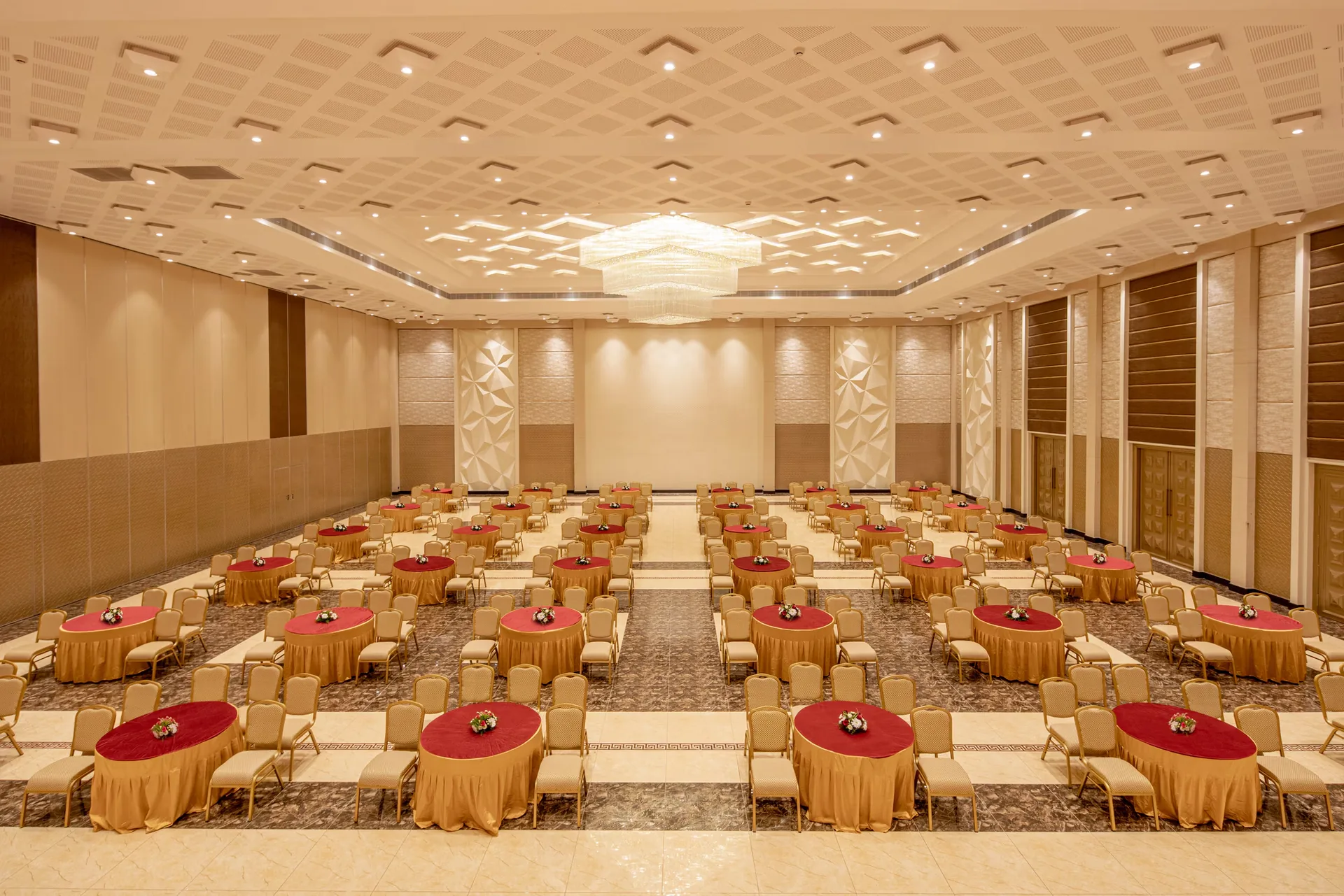 Round-table banquet setup at Suganya Convention Centre, Pondicherry